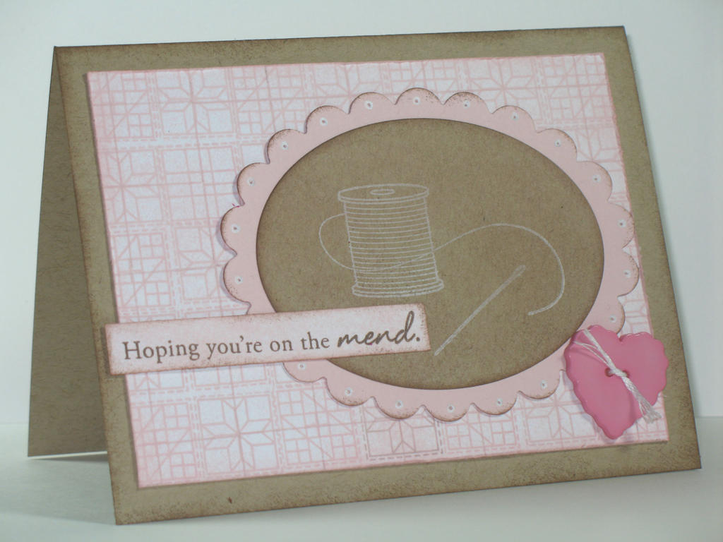 I used Guide Lines to create a monochromatic quilt for my background paper and then sponged the...