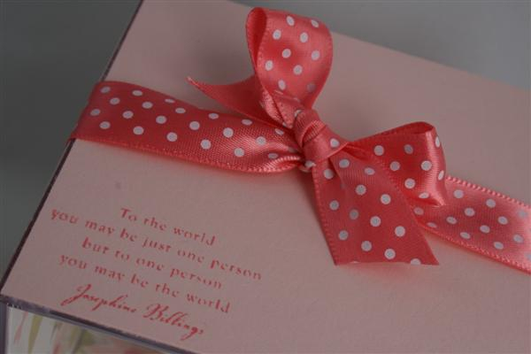 The ribbon and saying close up.