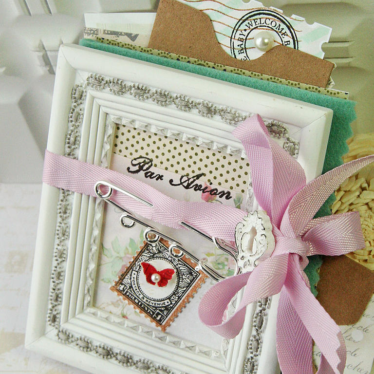 Postmarks Mini Album<br />
<br />
Made a little mini album with the Postmarks papers and...