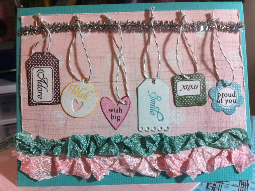 Graduation card using tiny tags stamp and die set. Tinsel pipe cleaners, papers from stash and...
