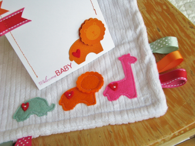 A sweet and simple taggie blankie and card set for baby!  <br />
<br />
I embroidered and...