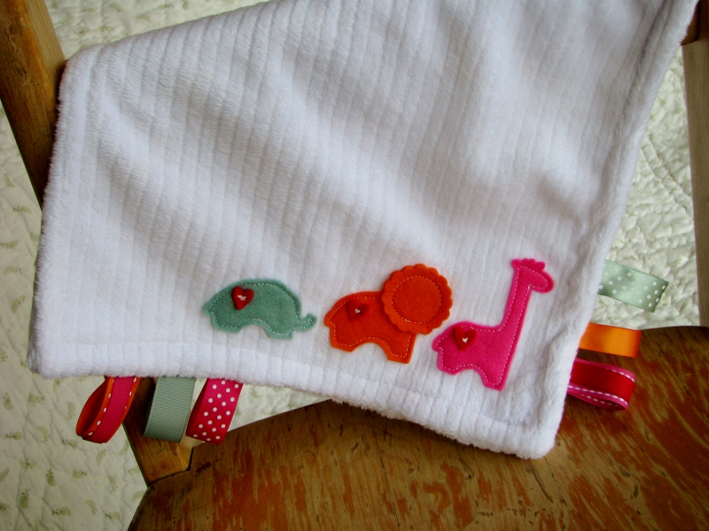 A sweet and simple taggie blankie and card set for baby!  <br />
<br />
I embroidered and...