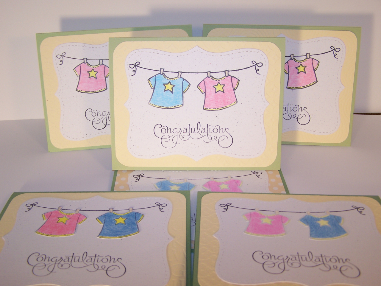 PTI "clothesline" stamp from Banner Builder; Baby shirt from Stampendous &amp;...