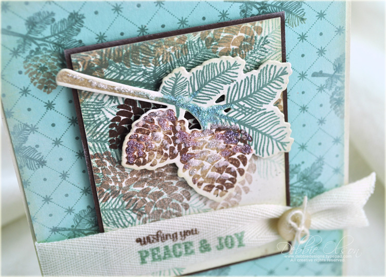 Stamps: Peaceful Pinecones<br />
Ink:  Kraft, Chocolate Chip, Ocean Tides, Chamomile Distress...