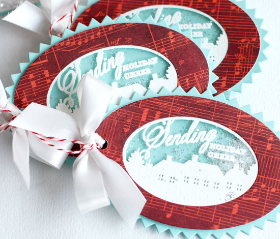 stamps:  2012 Holiday tags<br />
ink:  versamark<br />
cardstock:  aqua mist<br />
dies:...