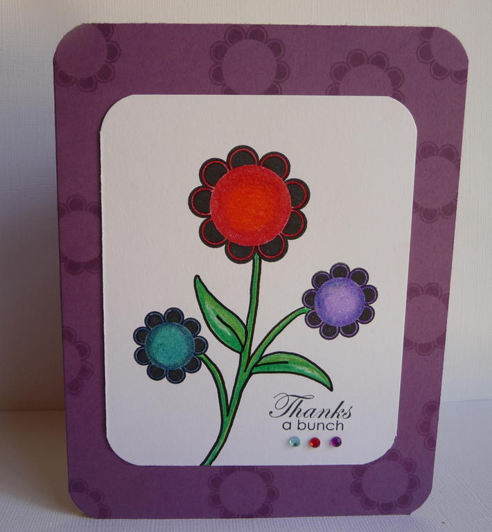 Floral frenzy.  Stamped in black and the colored with prismas.  The stem was hand drawn by me.