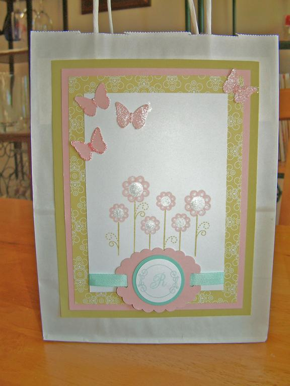 This gift bag, pen, paper clip, Post it holder, frame, and all of the cards that coordinate are...