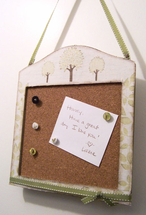 I embellished a small cork board with weaver&#039;s cloth and stamps from Father Knows Best,...