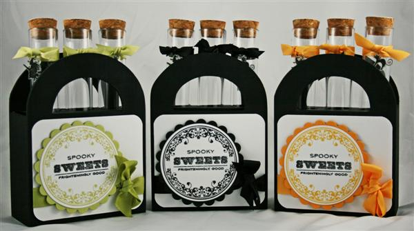 These are the three containers that hold the candy viles. Each vile is decorated with a top on...