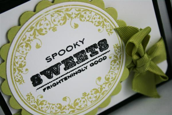 Close up of Spring Moss front. I used the Essential Glue Pad and black glitter for the centers.