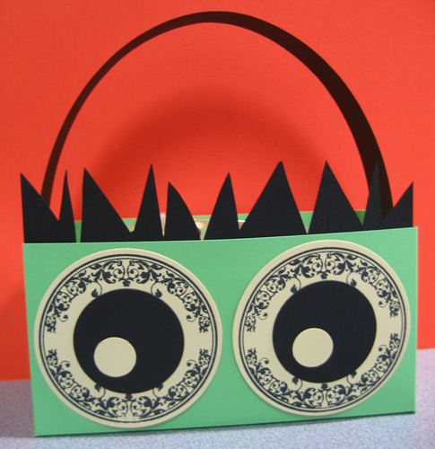When I saw the circle for Spooky Treats II, I thought that would make really cool eyes.  I...