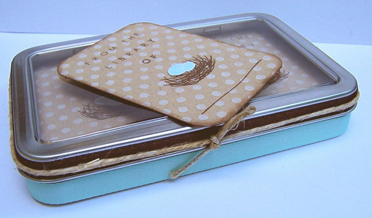 The tin is one of PTI&#039;s large hinged window tins.  The twill ribbon is a perfect fit to...