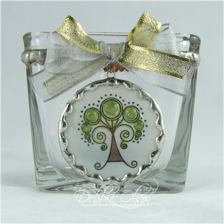 I chose the Tree of Life image to create a glass charm for this votive holder. The image is...