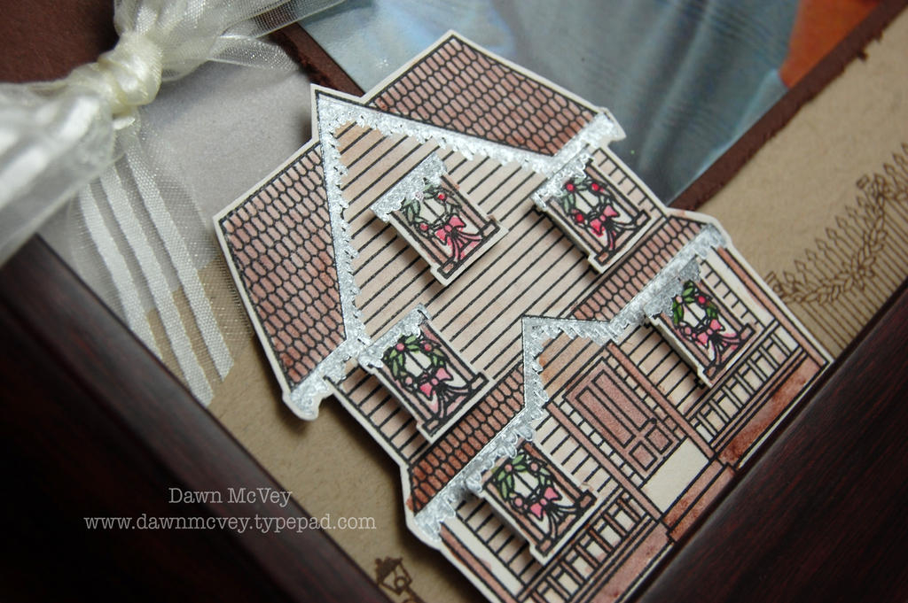 I stamped the snow for the gables on the house using Metallic Silver Encore ink.  It gives the...