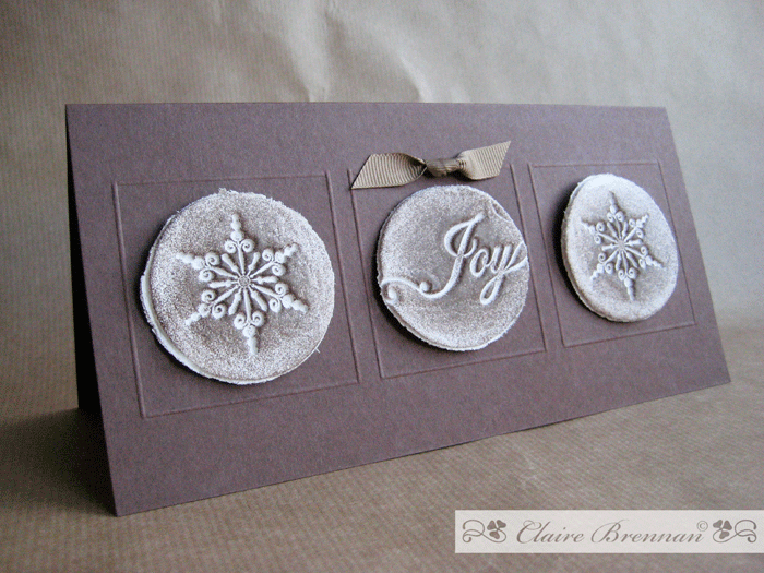 Air dry clay stamped with nowflake serenade. coloured when dry