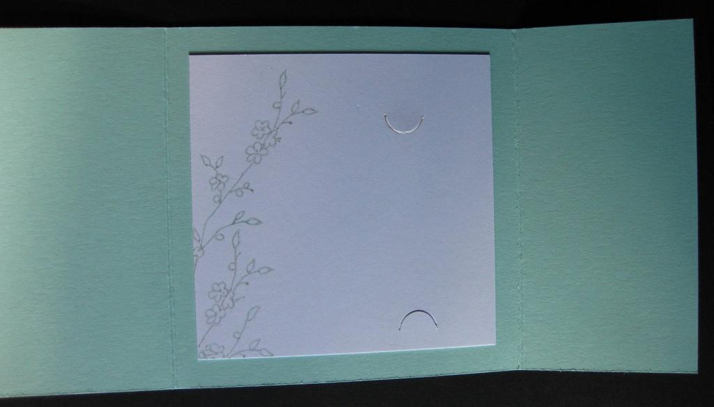 The inside of the gate fold wedding card.  With slots to hold the check/gift card<br />
more...