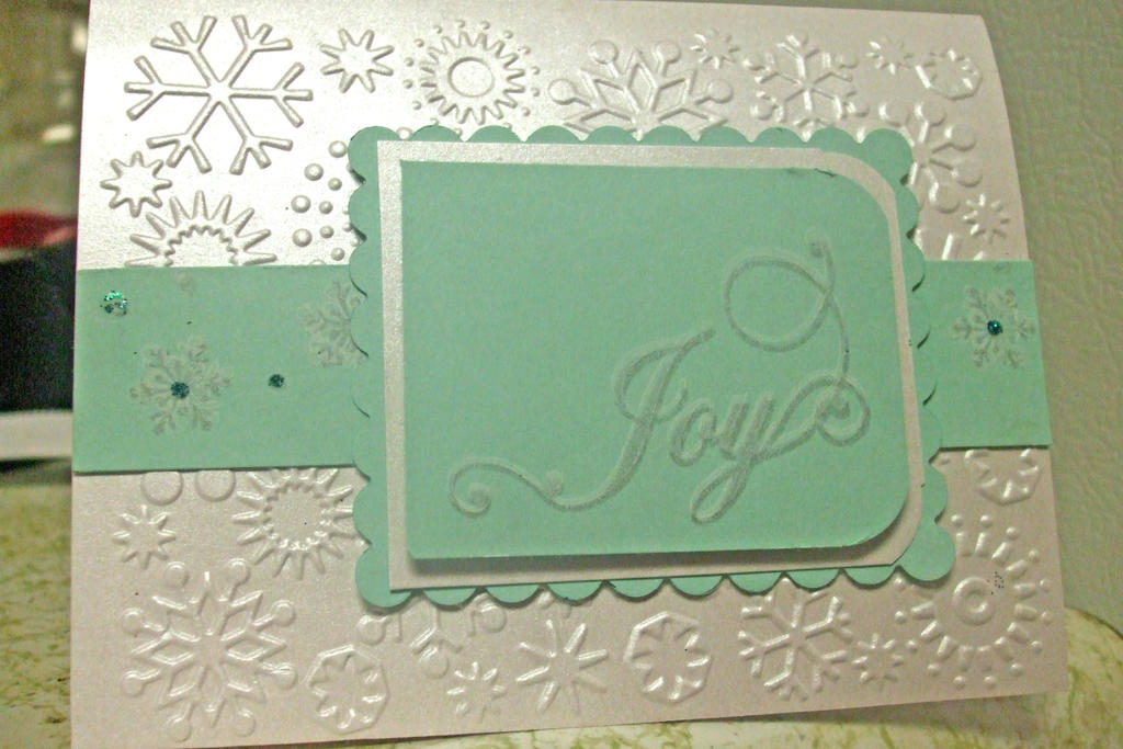 I used my Snowflake Serenade from last year and the new shimmery white cardstock.  I tried the...