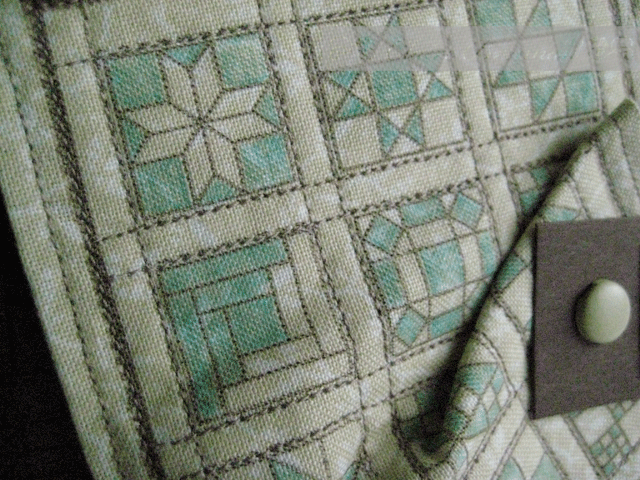 Close up of quilters sampler card