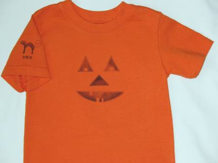 A fun Halloween t-shirt for my neice.<br />
I used Palett Noir black ink and the Spooky Sweets set.