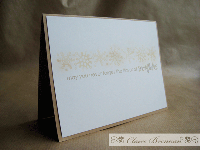 I stamped the snowflakes in lemon juice and then heated it with a heat gun till it urned the...