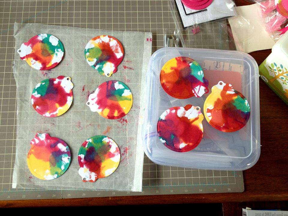 I did my tie-dying on wax paper spread on top of my desk mat. That was a GOOD plan... I highly...