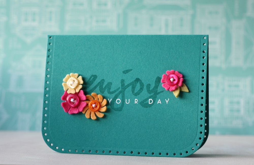 Cardstock: Tropical Teal<br />
Ink: VersaMark<br />
White Embossing Powder<br />
Dies: Bitty...