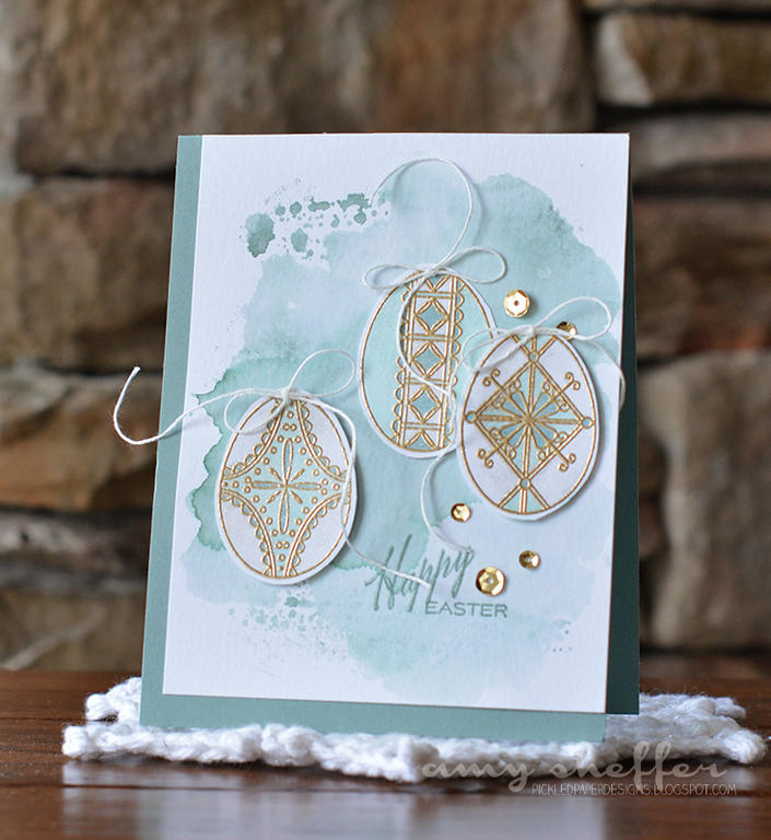 Stamps: Etched Easter Eggs<br />
Ink: VersaMark, Ocean Tides<br />
Paper: 140-pound watercolor...