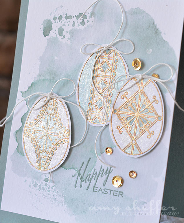 Stamps: Etched Easter Eggs<br />
Ink: VersaMark, Ocean Tides<br />
Paper: 140-pound watercolor...