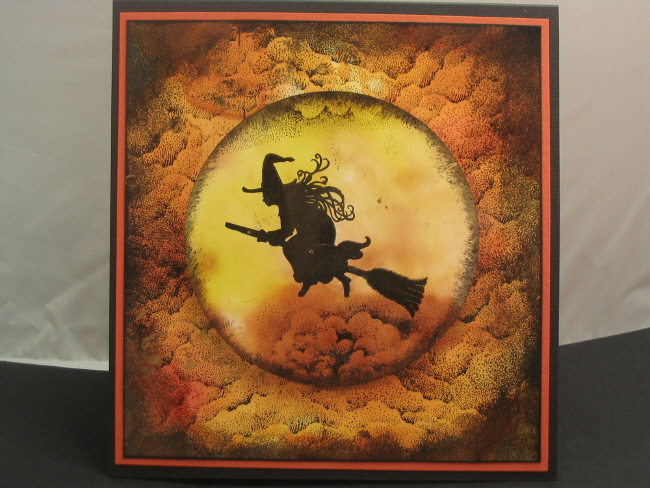 I created the background papers using alcohol inks on Kromekote Plus by Smartpapers.  The clouds...