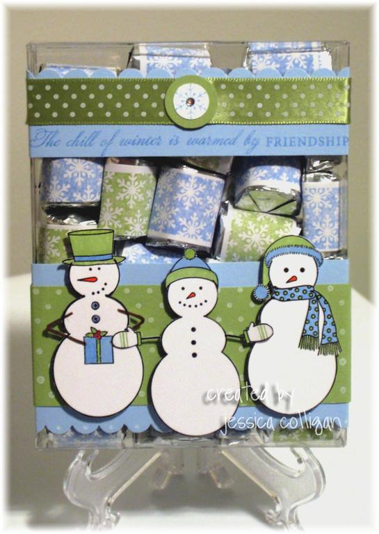 I made this treat box using one of PTI's clear card boxes. I simply covered it all the way...