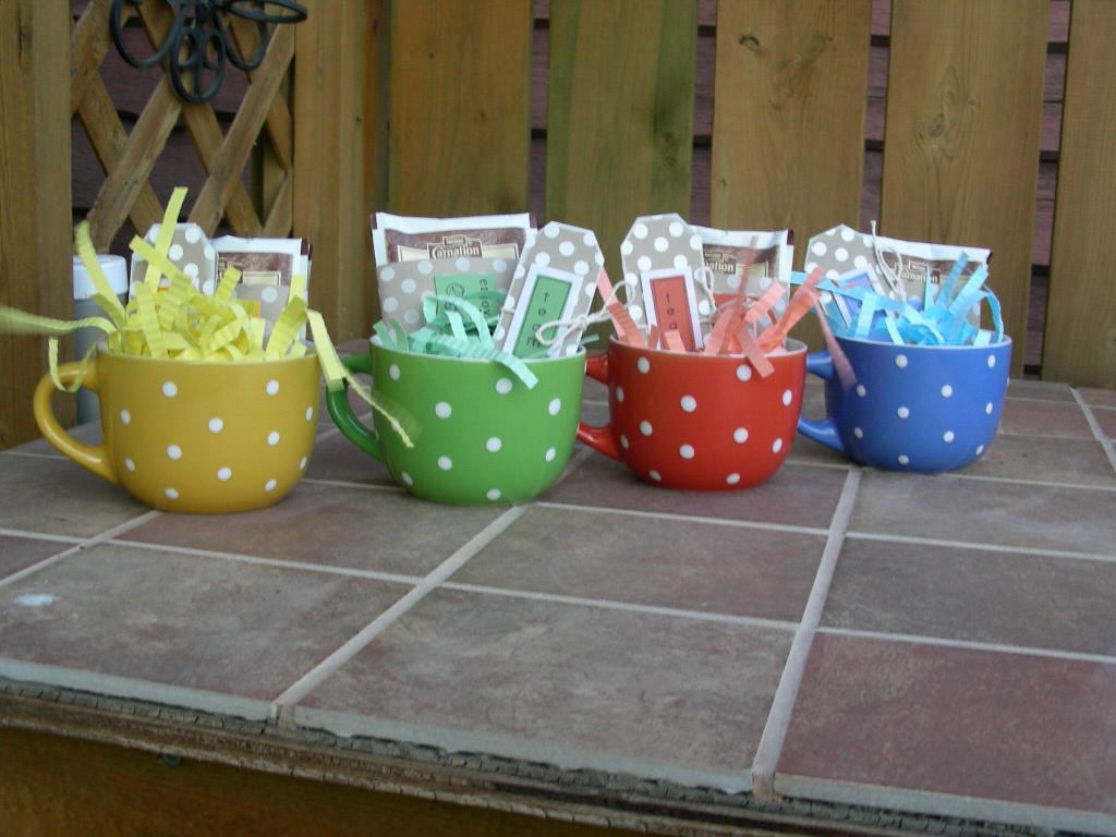 I made 8 of these for my new team at work.  I got the mugs at the dollar store and added hot...