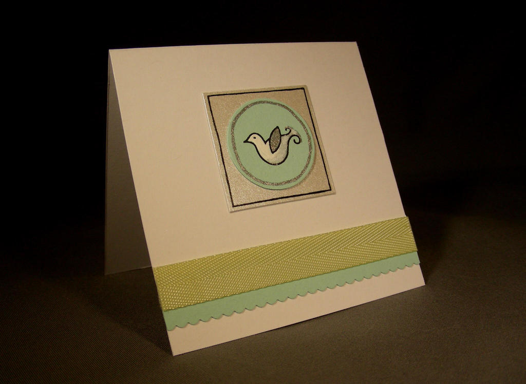 I made this for the Loonie Stamper Challenge #13.  Becky Oehlers pointed this cute little bird...