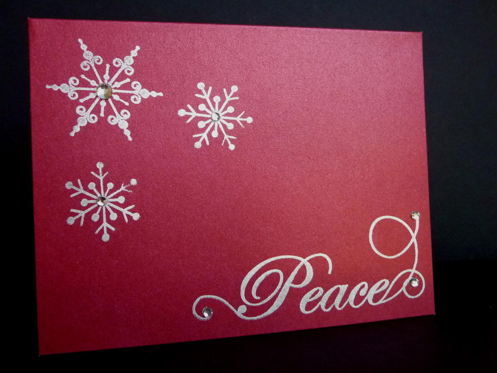 Simple Christmas card using snowflake serenade and encore silver ink.  When I say simple, I mean...