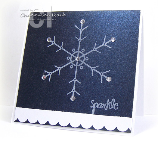 Stamped snowflake on Night Shimmer paper in Whisper White Craft ink, then added rhinestones.