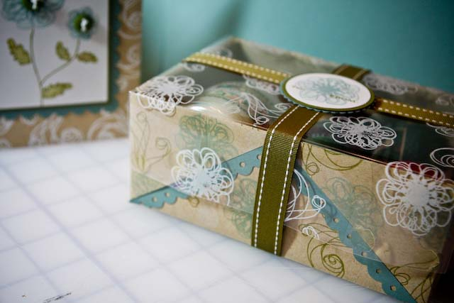I re-covered a box and made my own transparency lid and filled it with some Yankee Candles.<br...