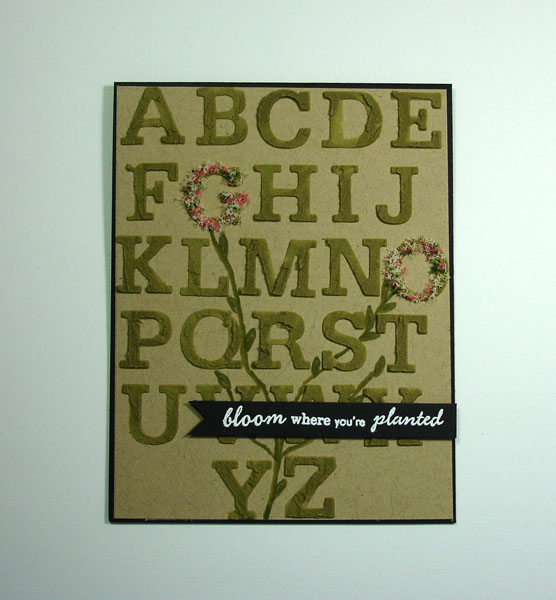 A stencil was made using Block Alpha Caps and then an embossing paste with Ripe Avocado was used...