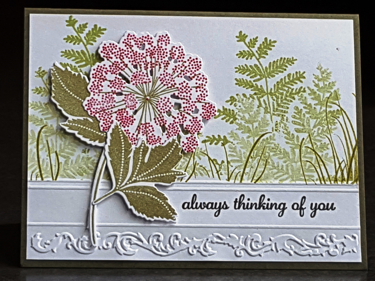 Meadow Greens foliage was stamped along a straight edge to create a border along the horizontal...