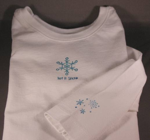 I stamped this little shirt for my neice.  I used a glitter facbric pen over the image that I...