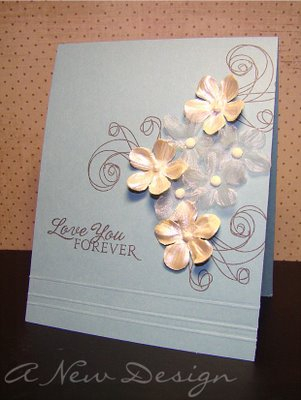 Very simple card to make!  Stamp swirlies and sentiment, then add primas (with brad) and score...