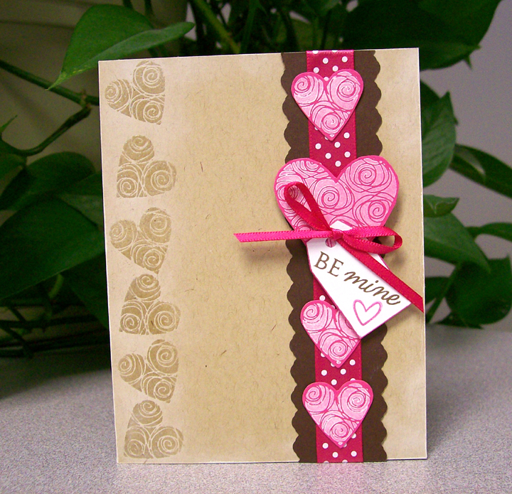 Paper:  Classic Kraft, Dark Chocolate, Raspberry Fizz<br />
Ink:  Versamark, Fresh Snow, Dark...