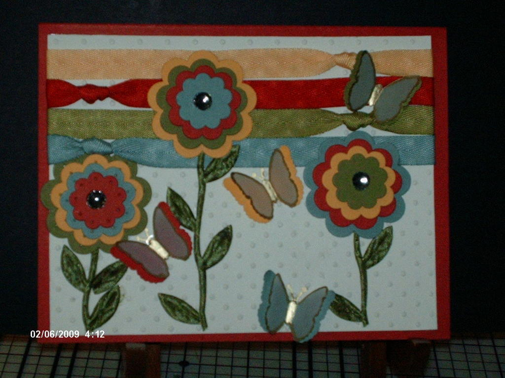 Used all 4 colors with the ribbon and paper.  Used the leaf ribbon as well.  The flowers were...