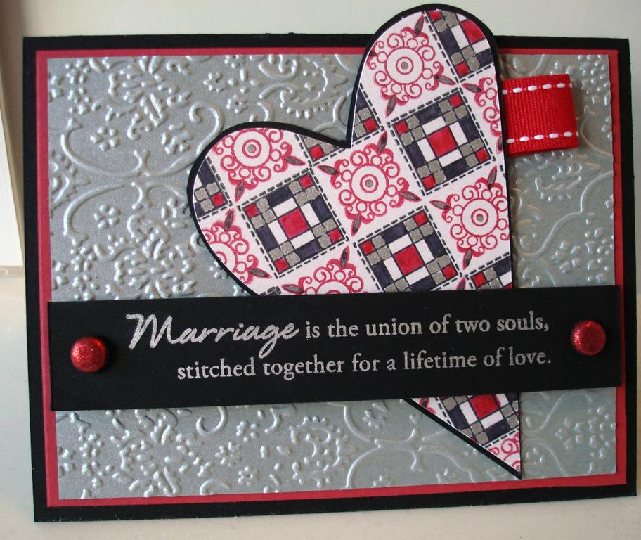Silver, black, red , white quilted wedding heart.