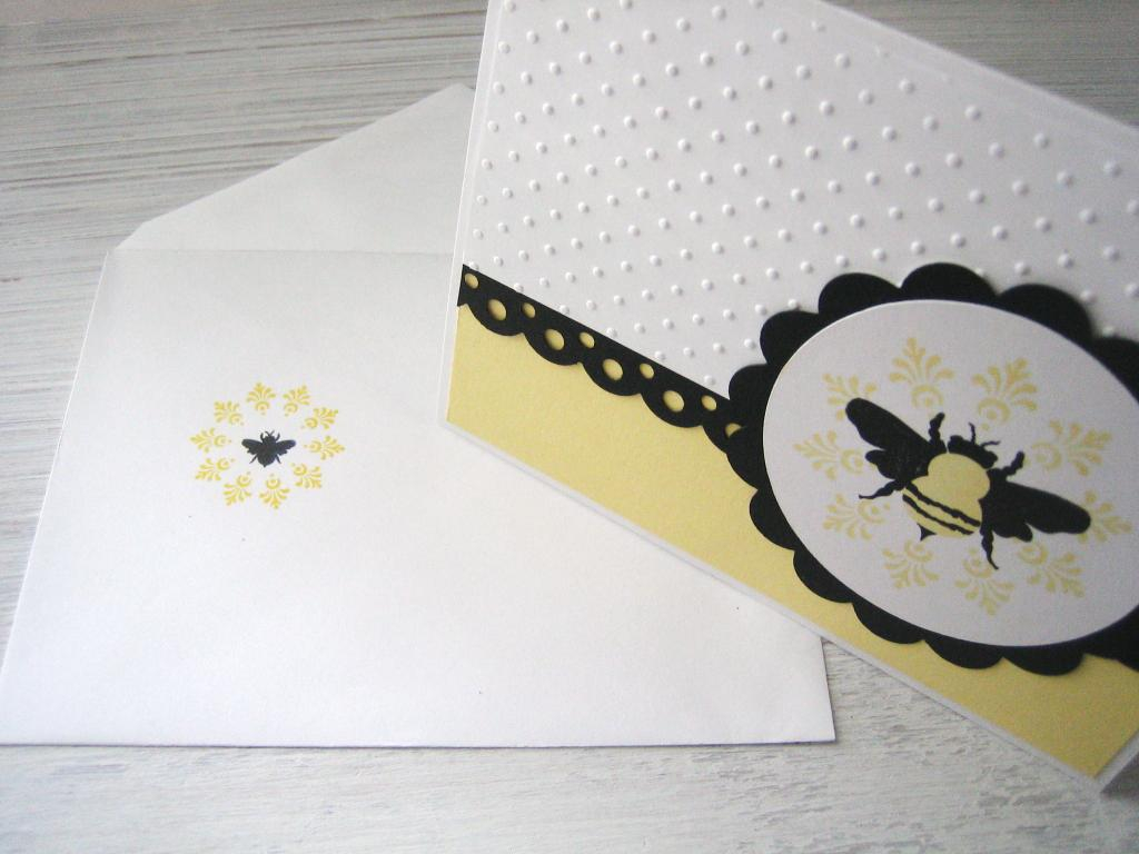 A touch of stamping lends a custom look to a plain white envelope.  Other supplies used are the...