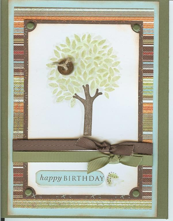 Lots of layers and some heat embossing in the tree.  I used my Copics to bring some contrast...