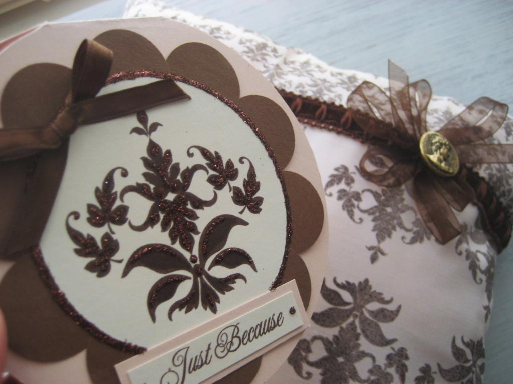 I stamped the fabric using permanent Staz on ink.  The pillow is hand stitched with a quick whip...