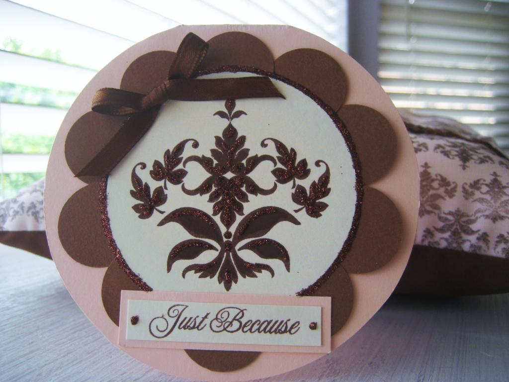 I couldn't resist a matching card for this easy gift.  I used a coluzzle to cut the round...