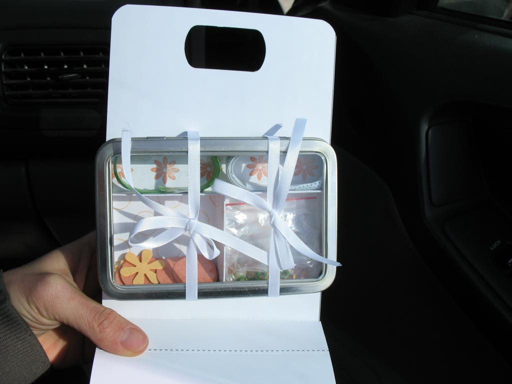 the inside. i used a nugget tin to store some embellishments.