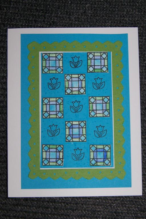 This is my first card made with this quilting set.  I stamped the quilt squares on water color...