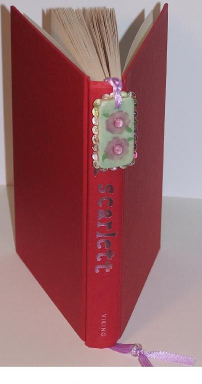 Domino Bookmark inside of book
