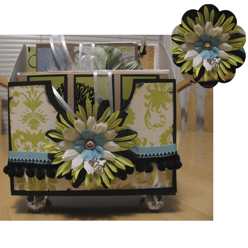 There's a pretty black pleated paper divider. This is being used to store some cards. There...